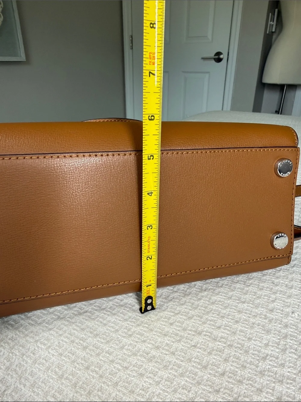 Michael Kors saddle tan saffiano leather satchel with silver hardware